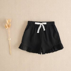 Short de niña negro con volantes